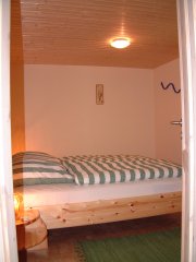 Bungalow 6, Schlafraum mit Doppelbett